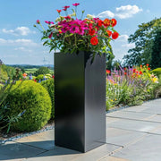 platinum black tall planter for sale on woven wood